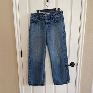 Levi’s Women’s low loose denim jeans. Size: W27 L 30. Darker blue color.